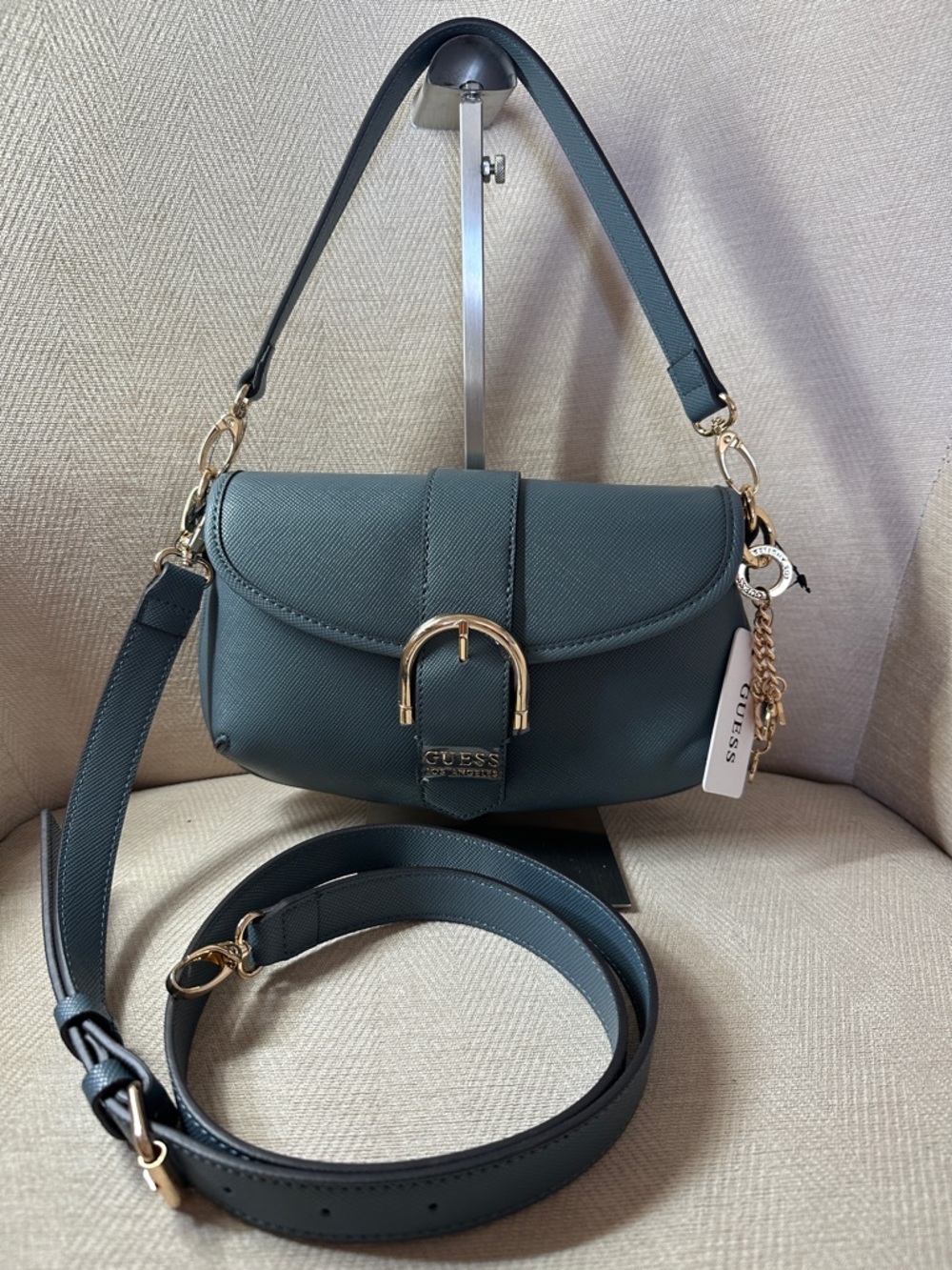 Guess Dark Denim Crossbody Saddle Bag with Gold Hardware